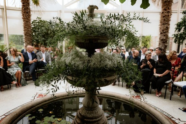 Fountain surrounding guests