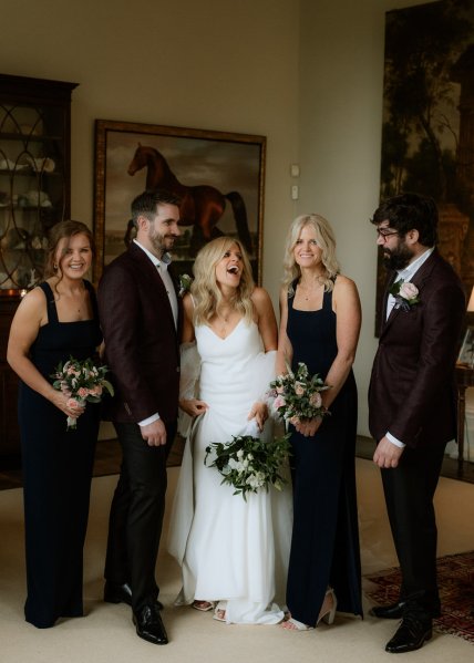 Bride groom family laughing