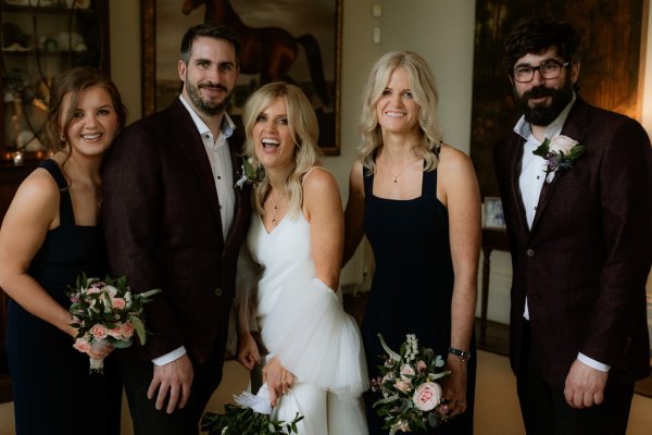 Bride groom family laughing