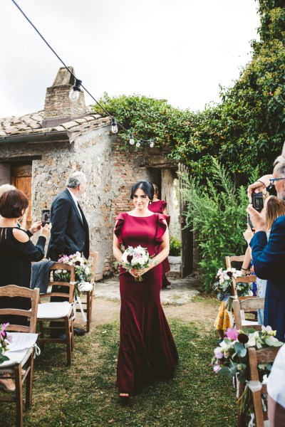 bridesmaids in red or pink with upstyle buns