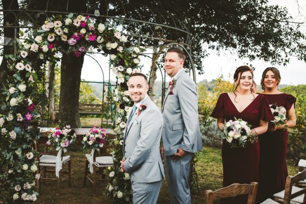 groom waits for bride at ceremony altar