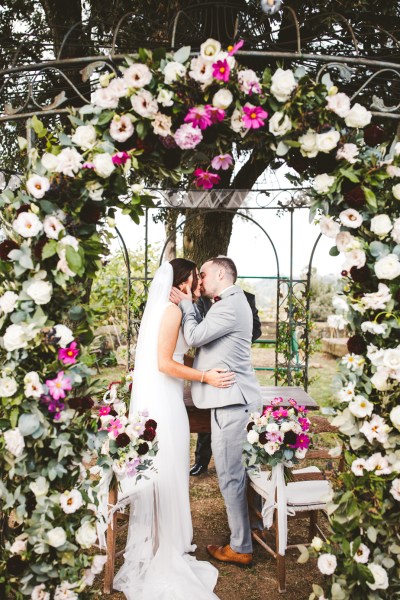 bride and groom couple kiss