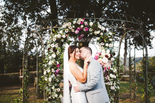 bride and groom couple kiss