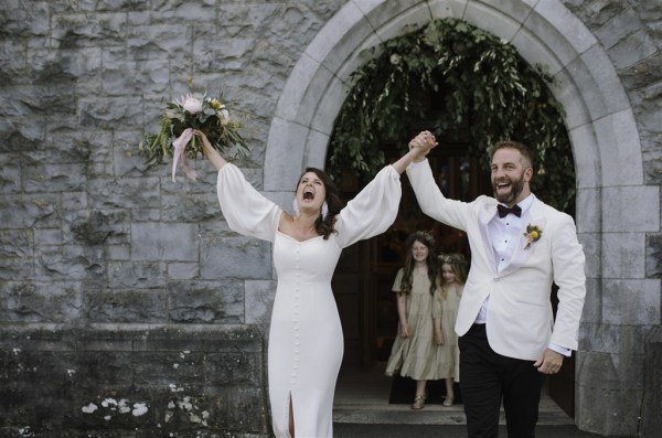 bride and groom celebrate after getting married