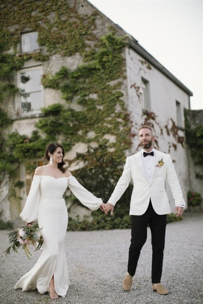 bride and groom in white tux