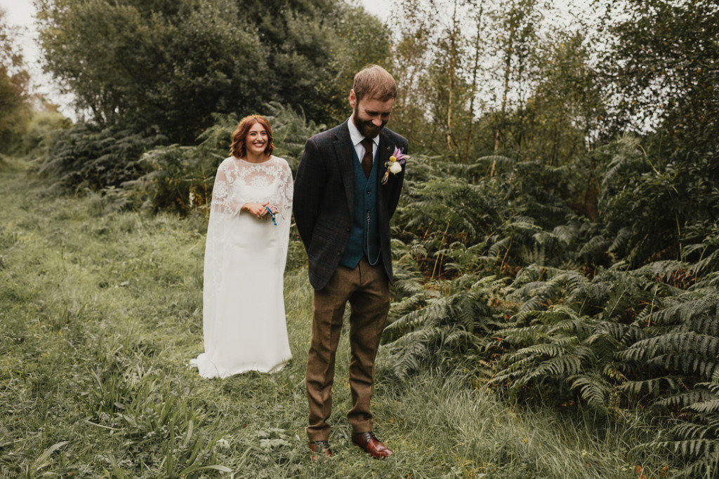 first look bride and groom outdoors