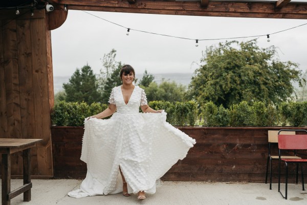 Bride on her own smiling exterior scenic view