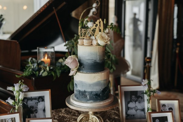 B&W Black and White photos on table pink rose cake candles White roses on cake treats macaroons Mr and Mrs Leacy couple