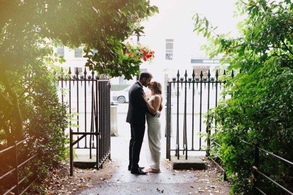 Bride and groom couple in Stephen's Green, she's wearing flats