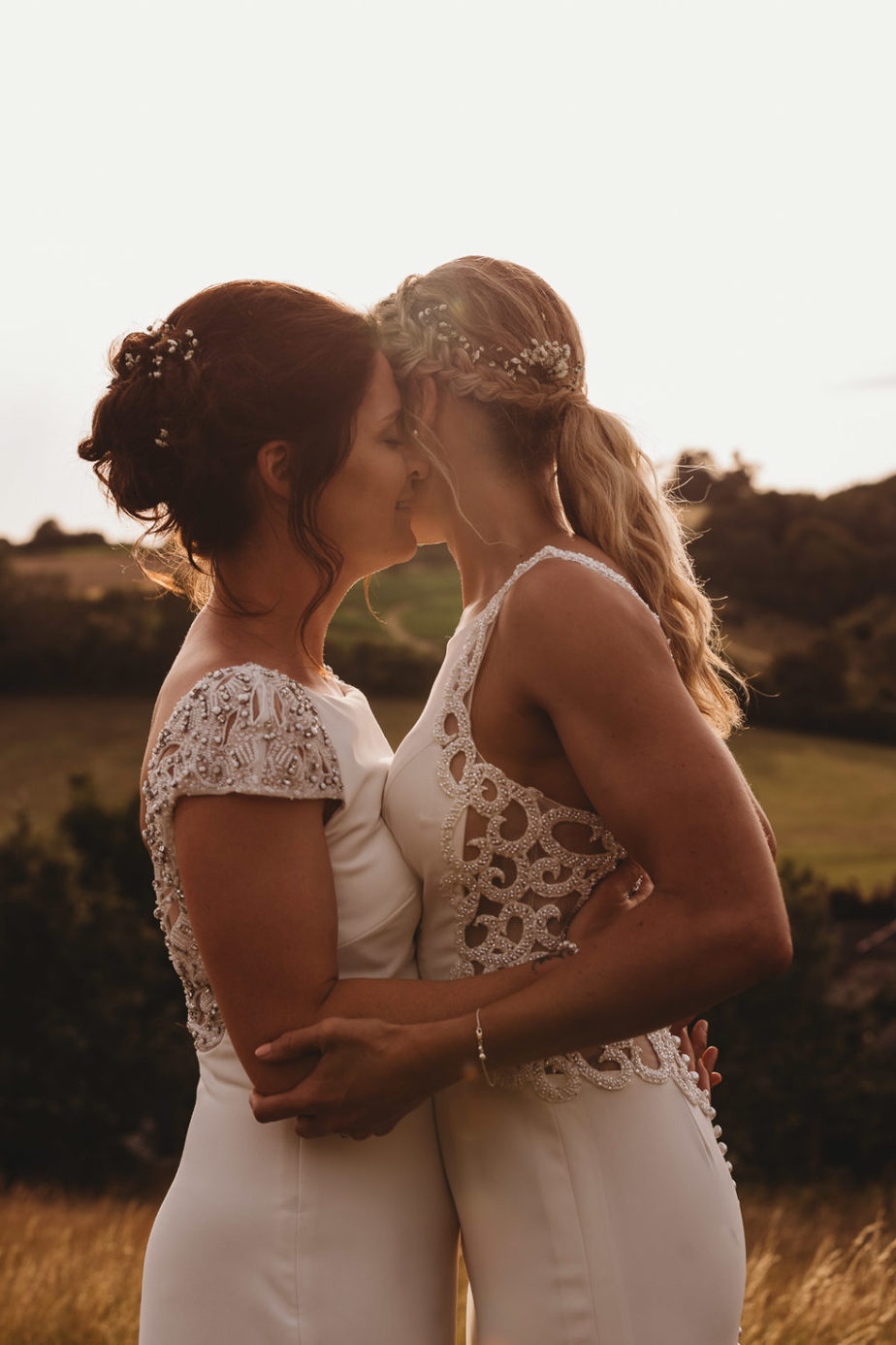 Bridal Ponytails | See more on OneFabDay.com Two brides A Summer Barn Wedding with a Twist: Leanne & Lyndsey