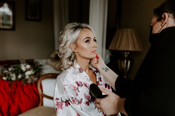 bride getting make up done