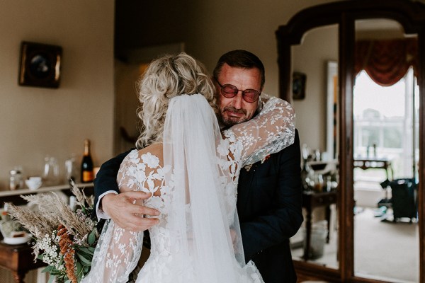 bride and father emotional