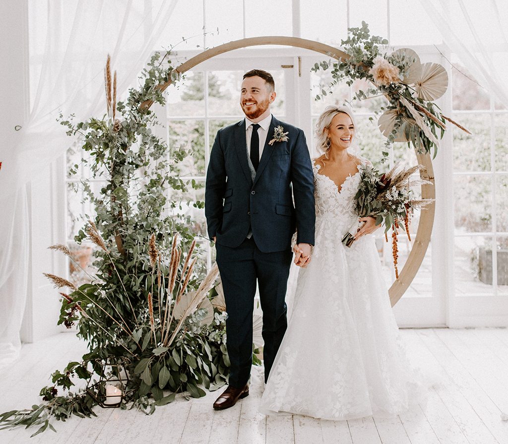 Bride and groom moongate arch