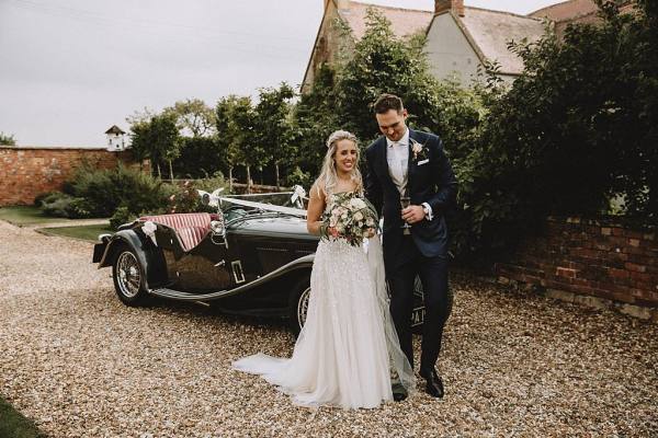 bride and groom wedding car