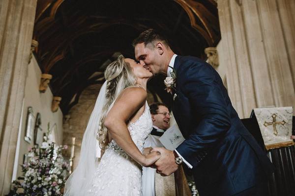 bride and groom kissing