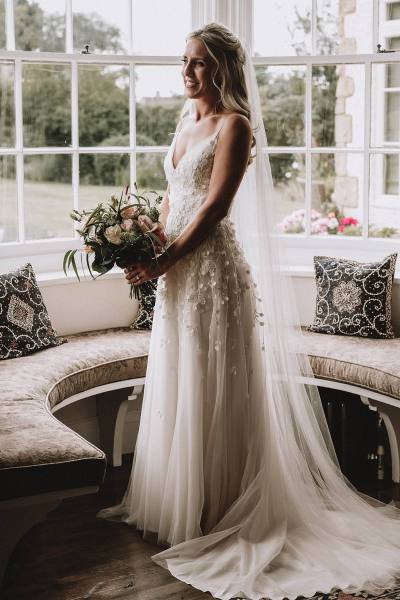 bride with bouquet wedding dress