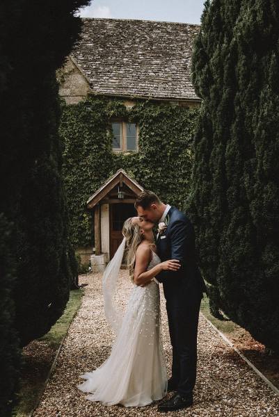 bride and groom kissing