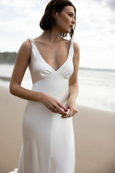 Bride on beach silk dress