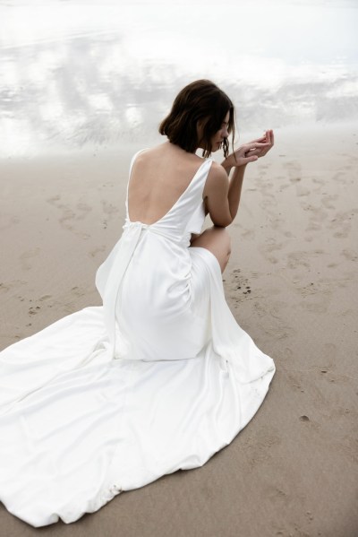 Bride on beach silk wedding dress