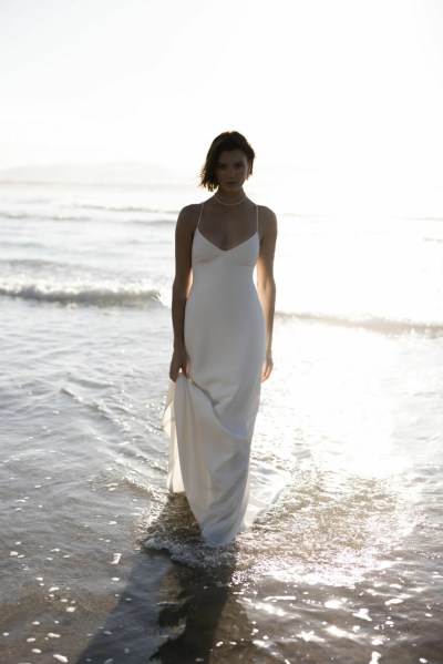 Bride on beach silk wedding dress