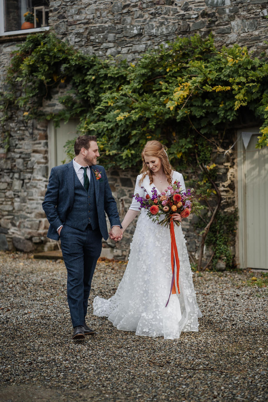 bride and groom colourful bouquet