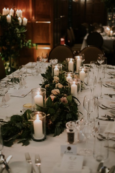 Candle lit dark lit setting dining room