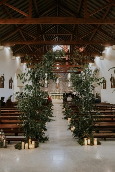 Ceremonial room pews and candles lit