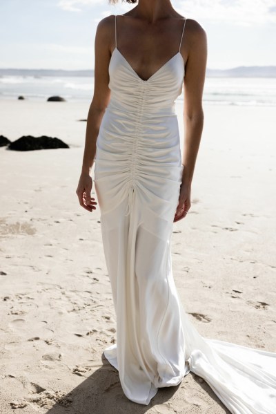 Bride on beach silk wedding dress Karen Willis Holmes