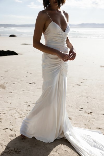 Bride on beach silk wedding dress Karen Willis Holmes