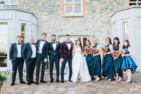 navy bridesmaids and tuxedos