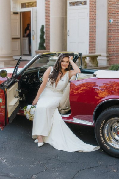 bride and groom wedding car red convertible