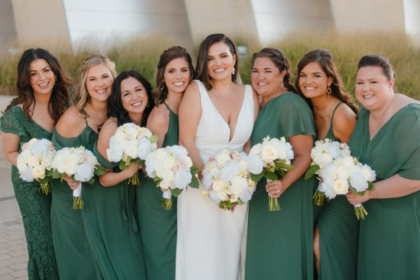 bride and green bridesmaids