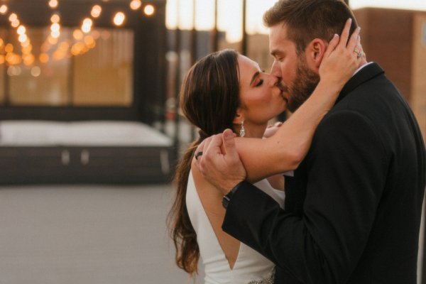 bride and groom kissing