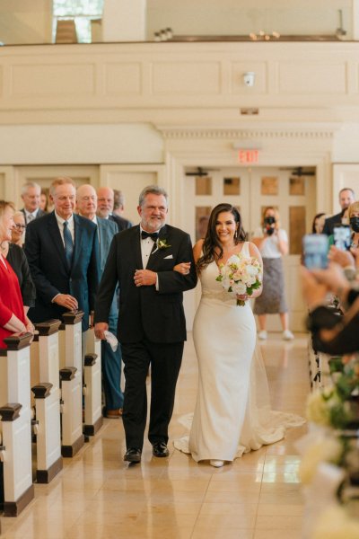 father walking bride down aisle