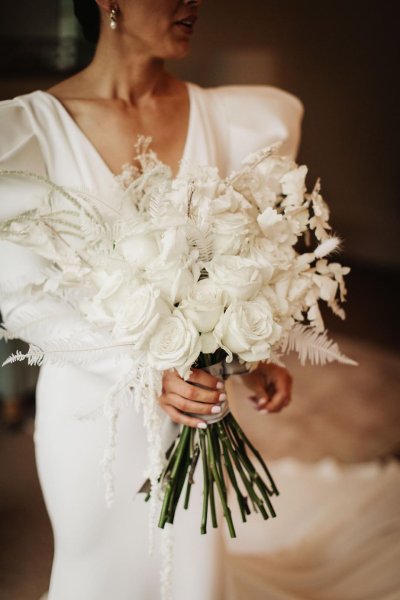 white bridal bouquet white roses and white fern