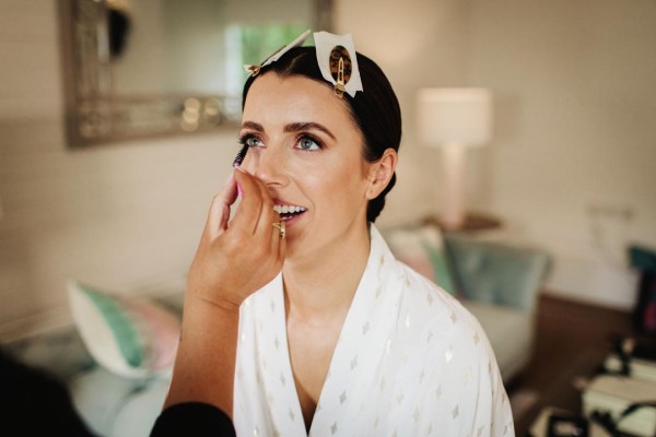 bride getting make up done