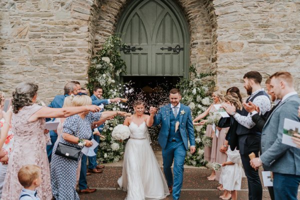 bride and groom floral ceremony entrance