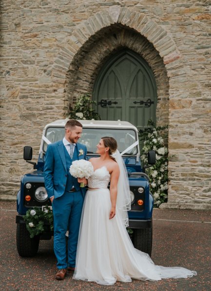 bridal party church entrance floral pillars