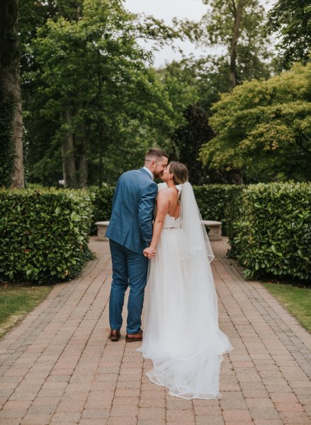 bride and groom blue suit