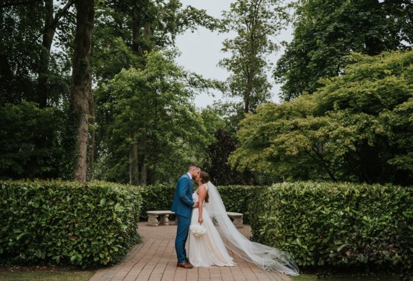 bride and groom blue suit