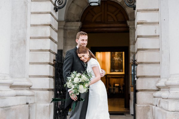 Bride and groom just wed outside of church