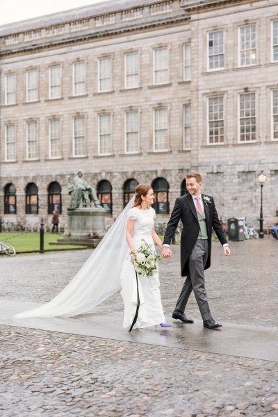 Trinity College church bride groom flowers veil college university Christmas