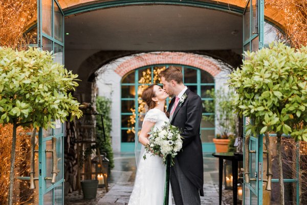 Trinity College church bride groom flowers veil college university Christmas