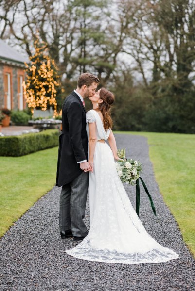 Trinity College church bride groom flowers veil college university Christmas venue