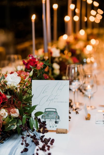 Interior autumnal dining room flowers cutlery champagne glasses