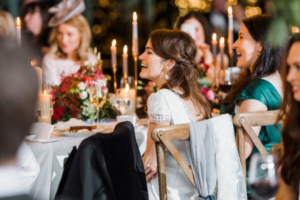 Bride laughing during wedding ceremony