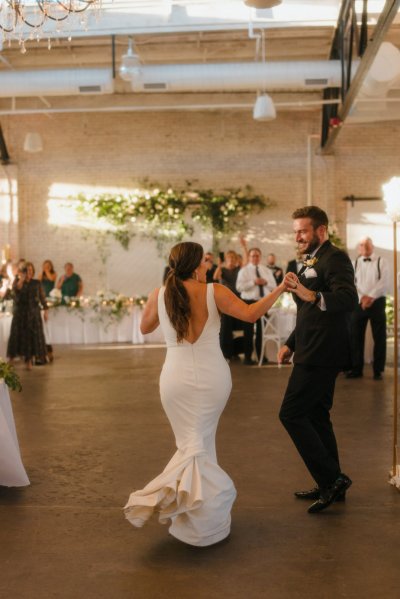 bride and groom dancing