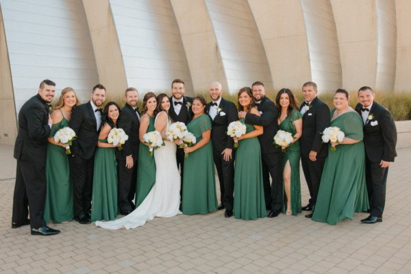 bridal party green bridesmaids and tuxedos