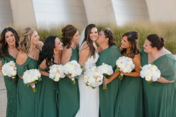 bride and green bridesmaids