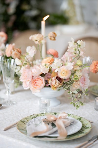 candle display roses pink flowers